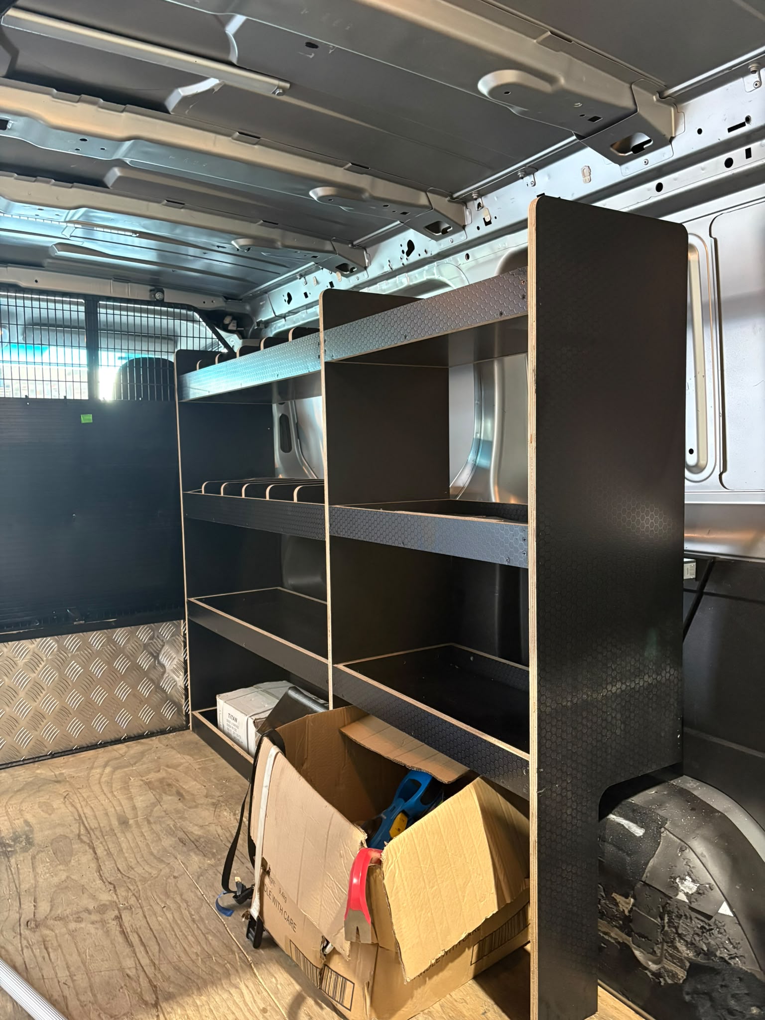 Custom shelving system for a Melbourne work van